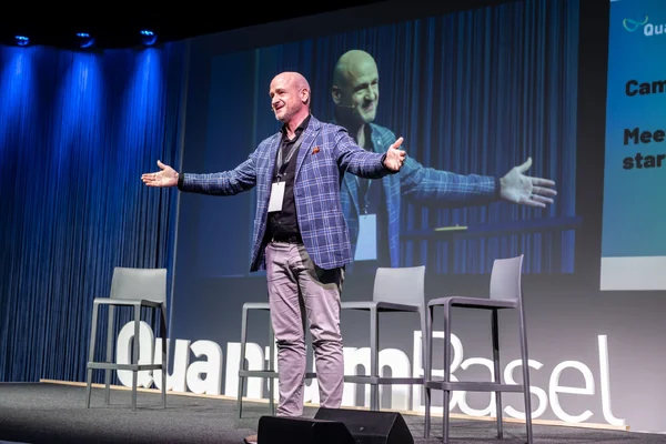 Damir Bogdan, CEO of uptownBasel Infinity and local host, welcomes around 300 guests to the first US-Switzerland Quantum Symposium.
